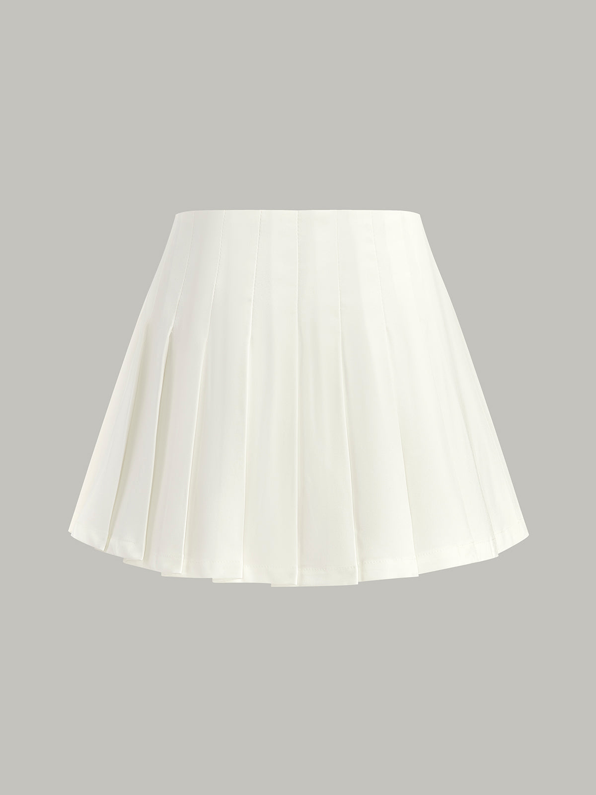 Jupe plissée taille mi-haute