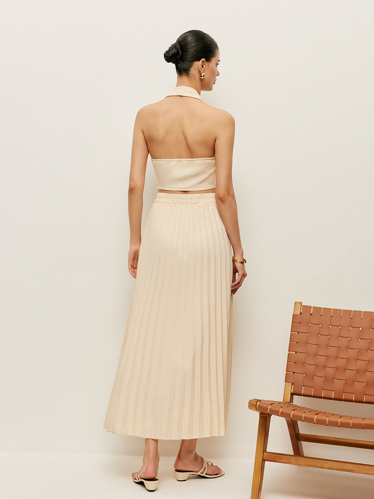 Ensemble gilet et jupe plissée