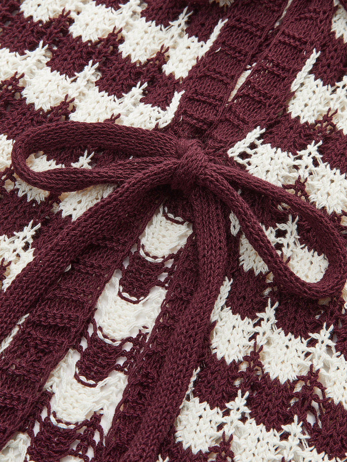 Stricktop mit Kontrast-Bindegürtel