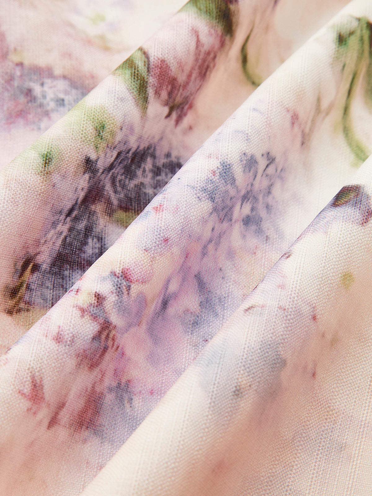 Robe fleurie à manches bouffantes et ceinture