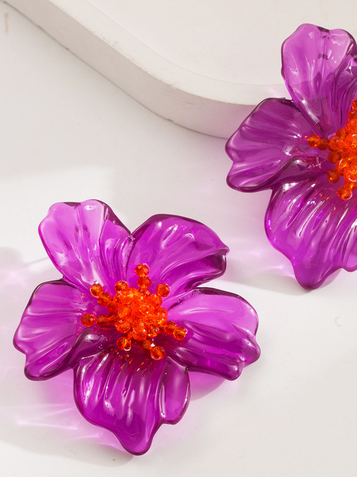 Boucles d'oreilles en résine en forme de fleur