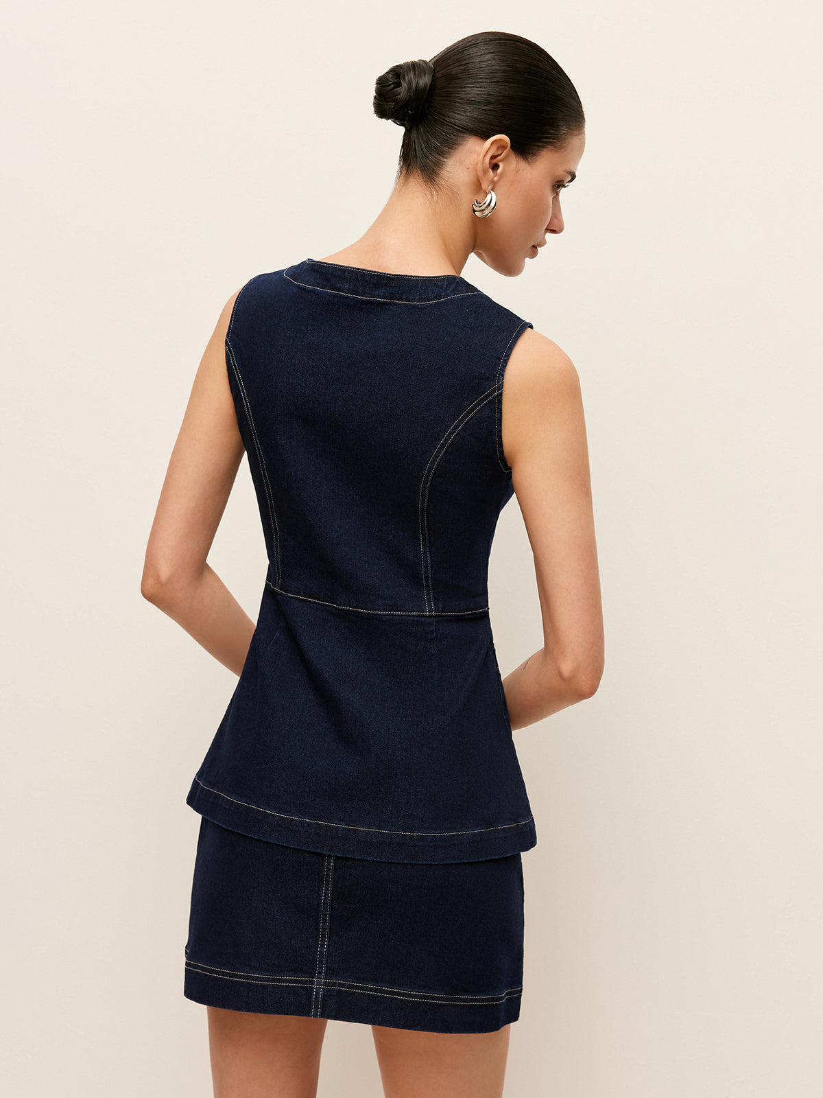 Gilet en jean boutonné sur le devant avec poches