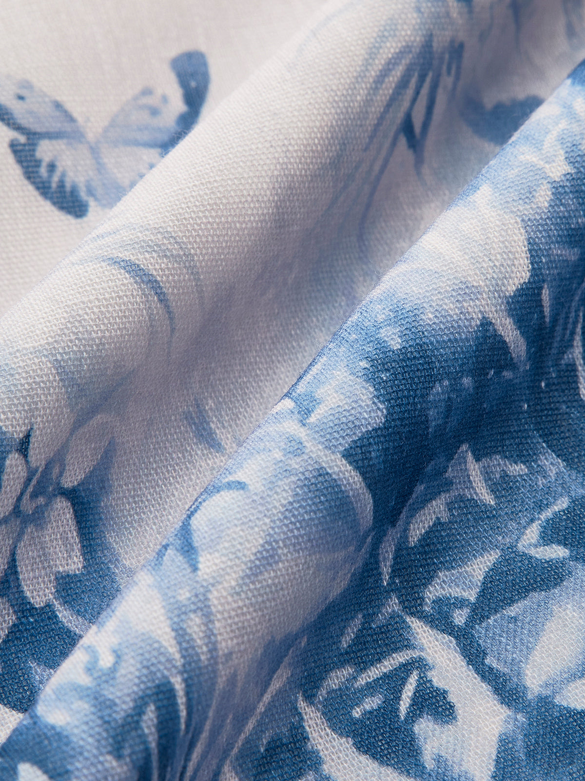 Kleid mit farblich abgesetztem Blumenmuster und Bindebändern