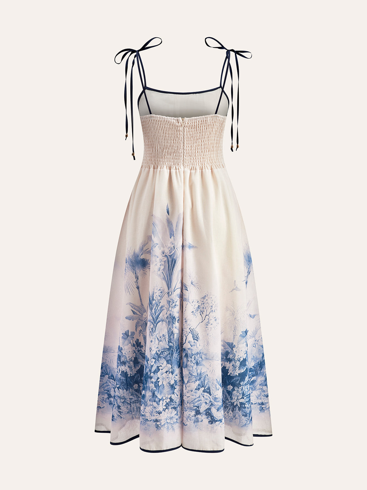 Kleid mit farblich abgesetztem Blumenmuster und Bindebändern