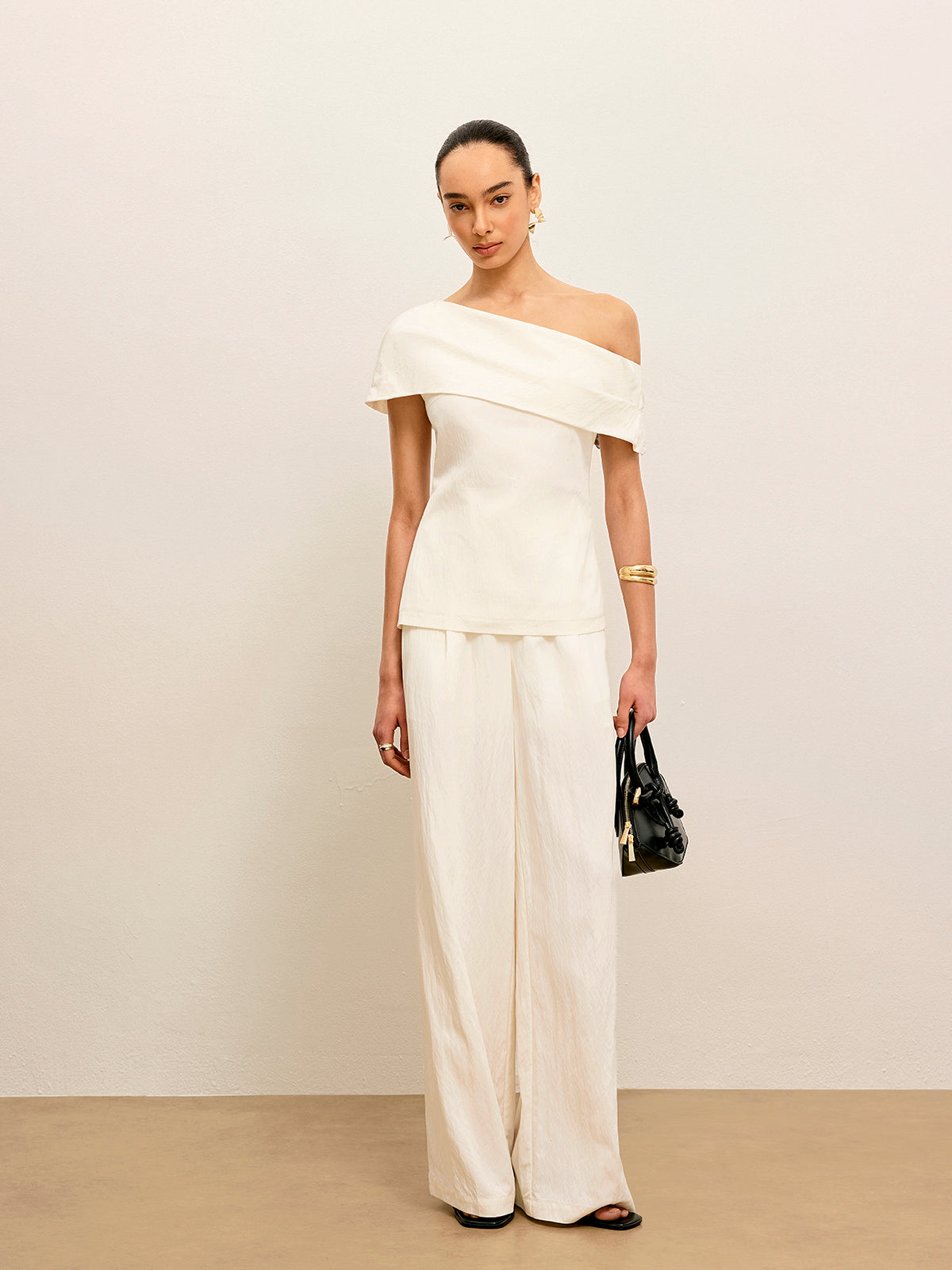 Hose mit Taschen an der mittleren Taille