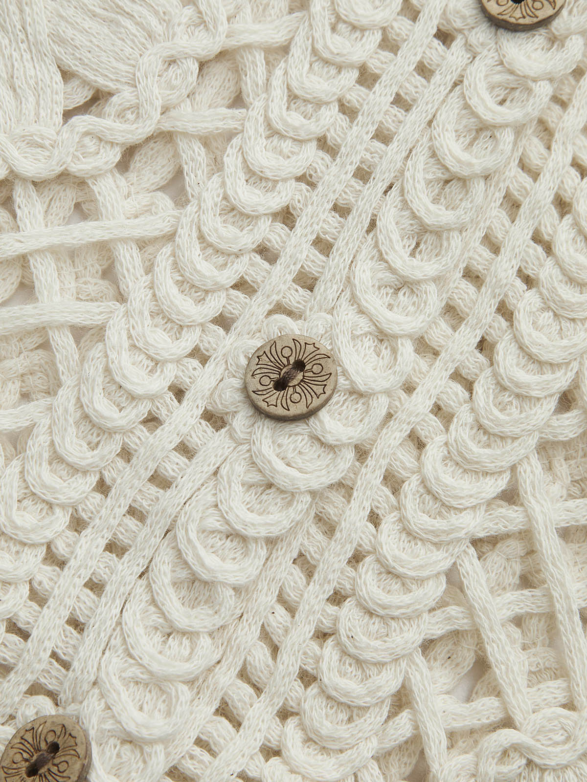 Débardeur en jacquard semi-transparent à découpes et col en V