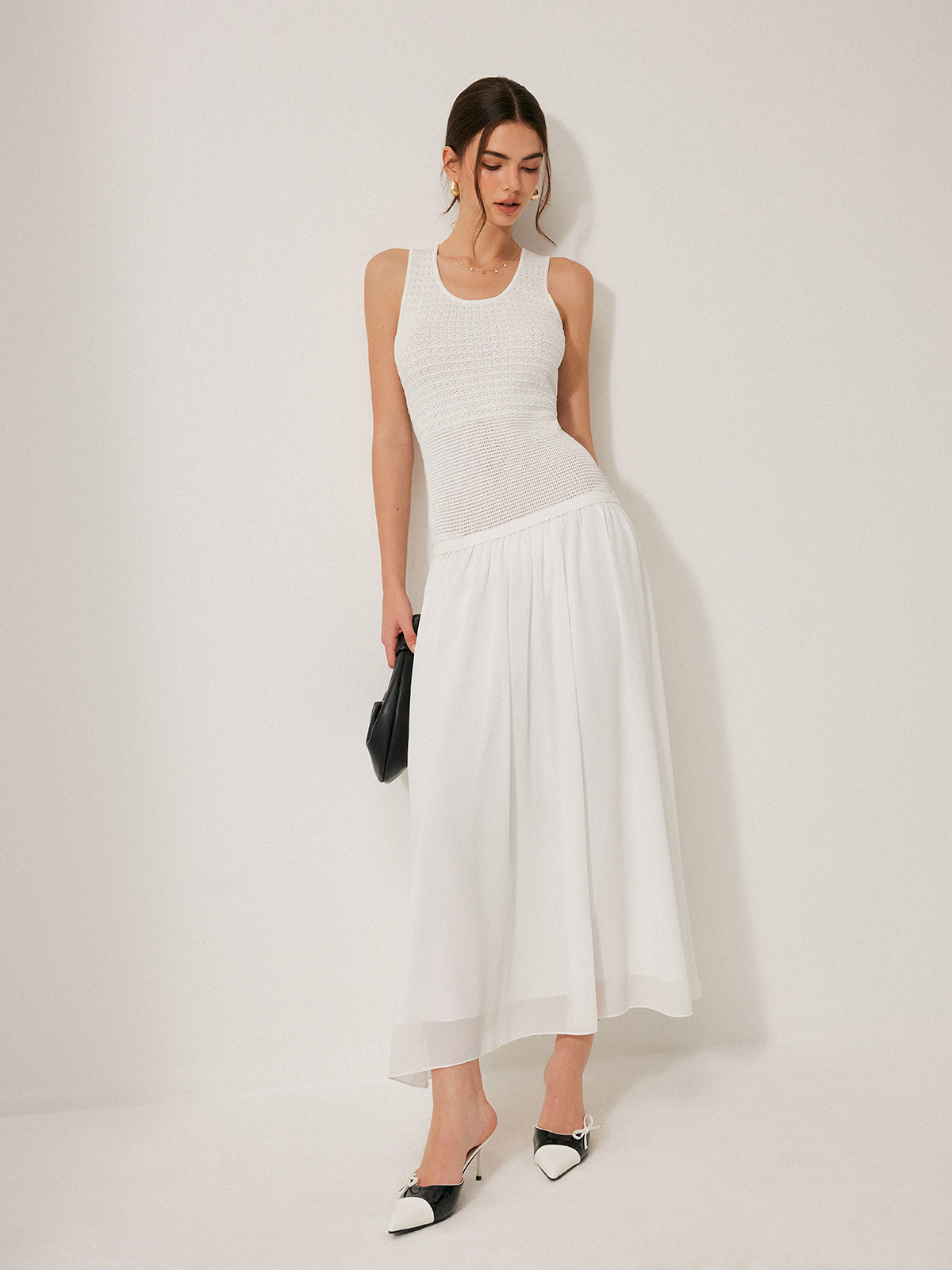 Halbtransparente ärmellose Strickkleid