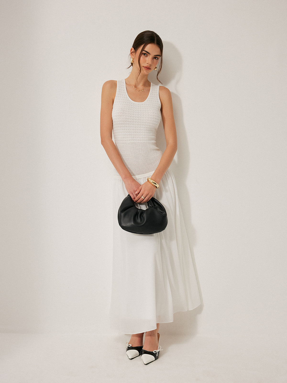 Halbtransparente ärmellose Strickkleid