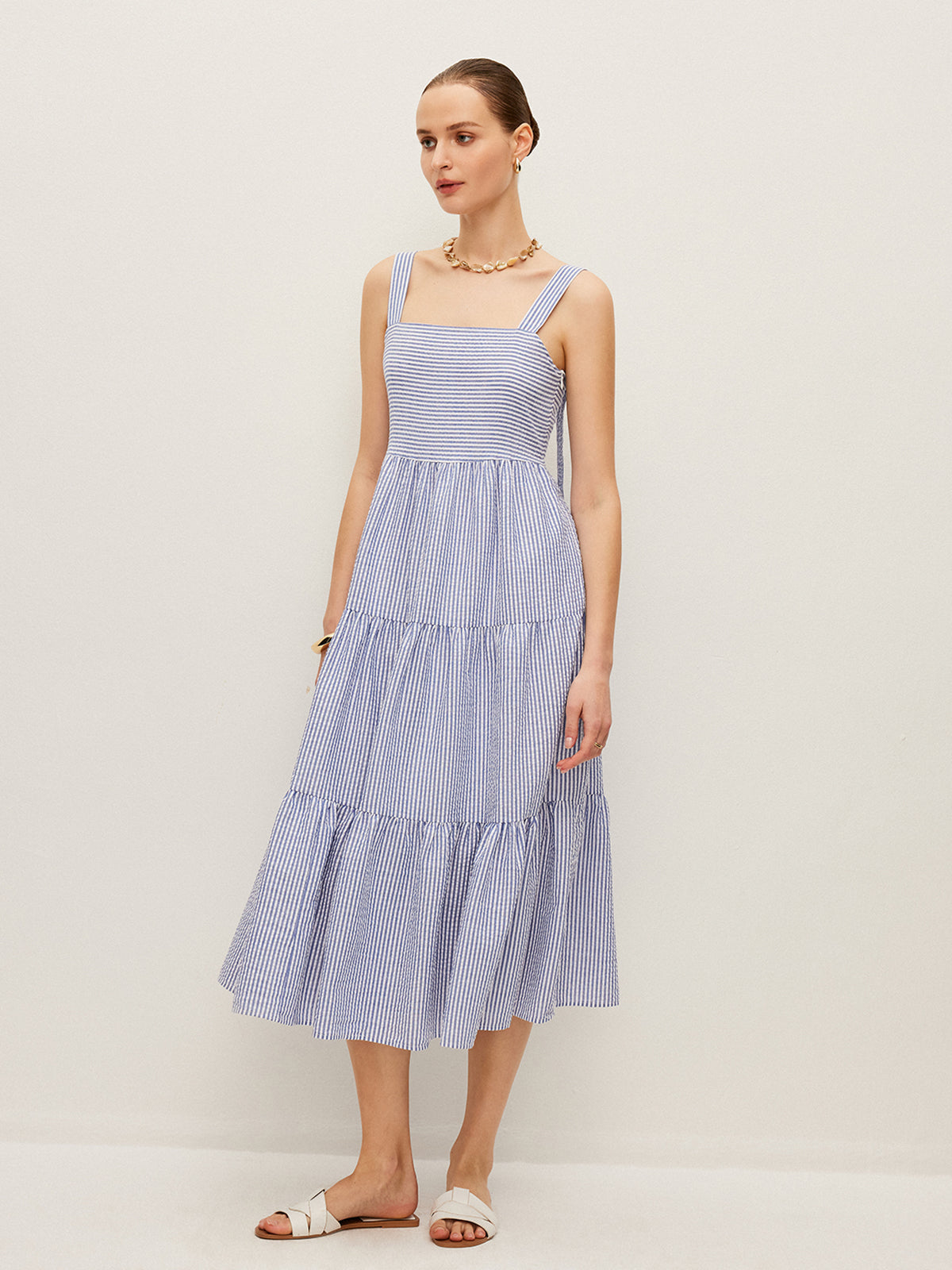 Robe sans manches rayée boutonnée