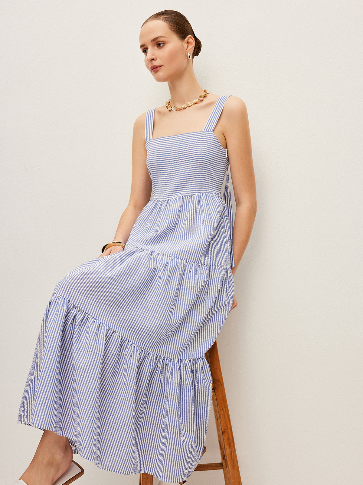 Robe sans manches rayée boutonnée