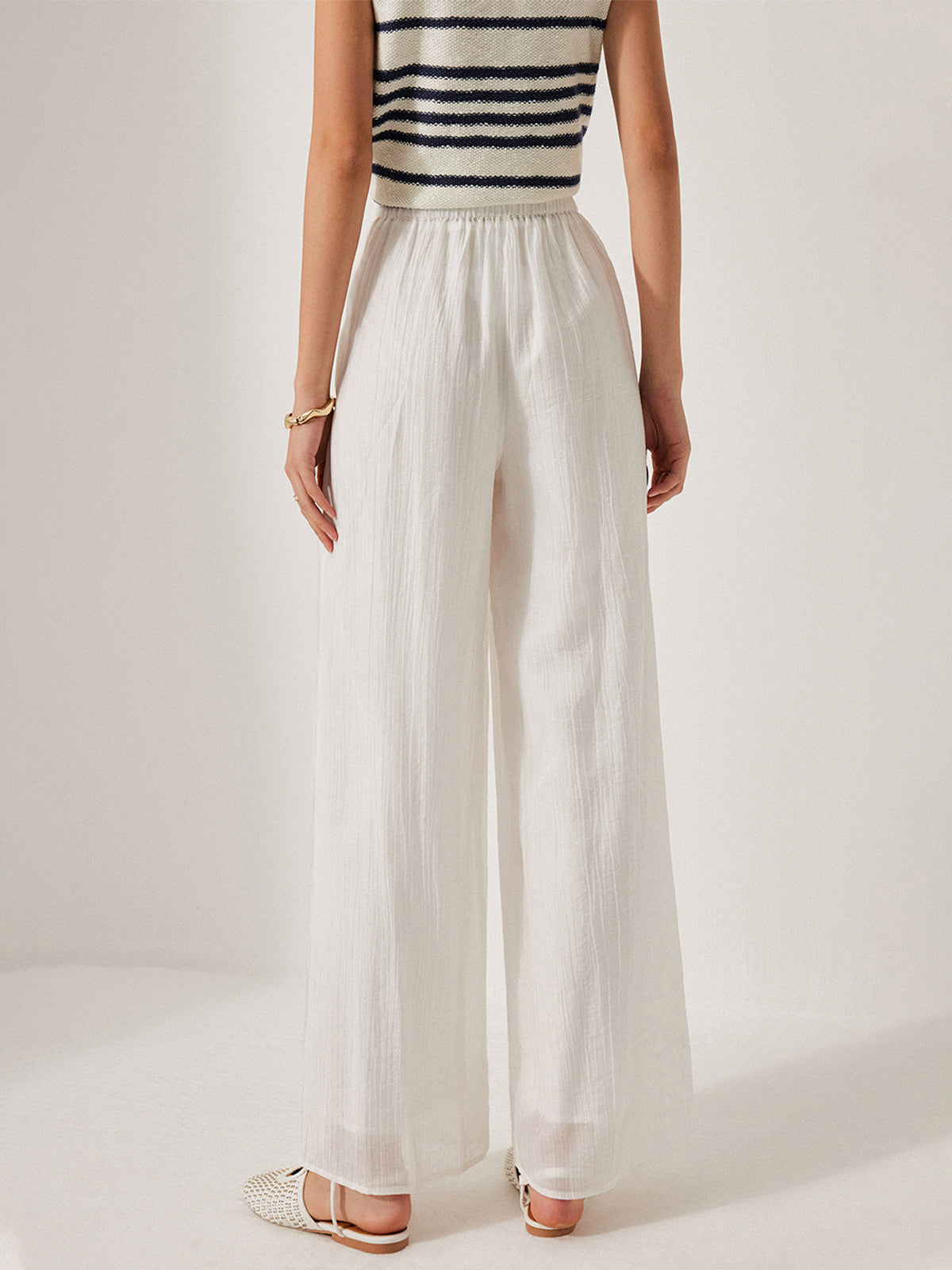 Hose mit mittelhohem Bund, Taschendetails und Bindeband