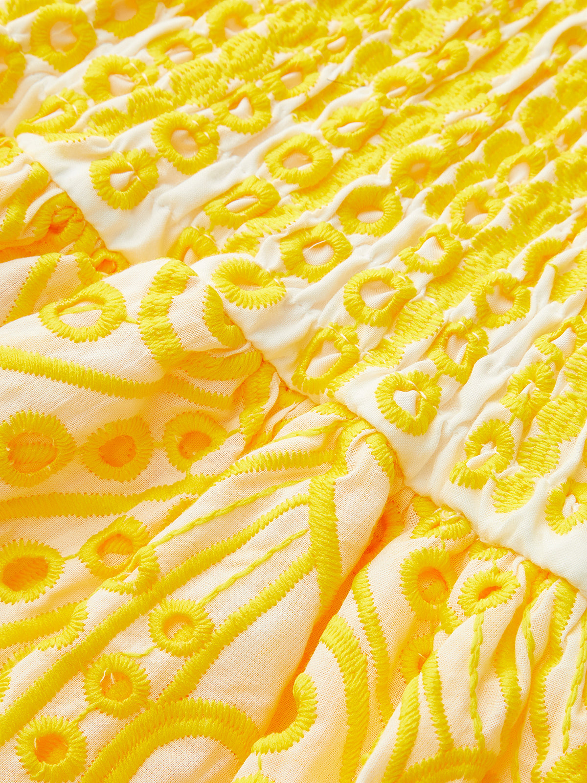 Trägerloses Baumwollkleid mit herzförmigem Dekolleté und besticktem Saum