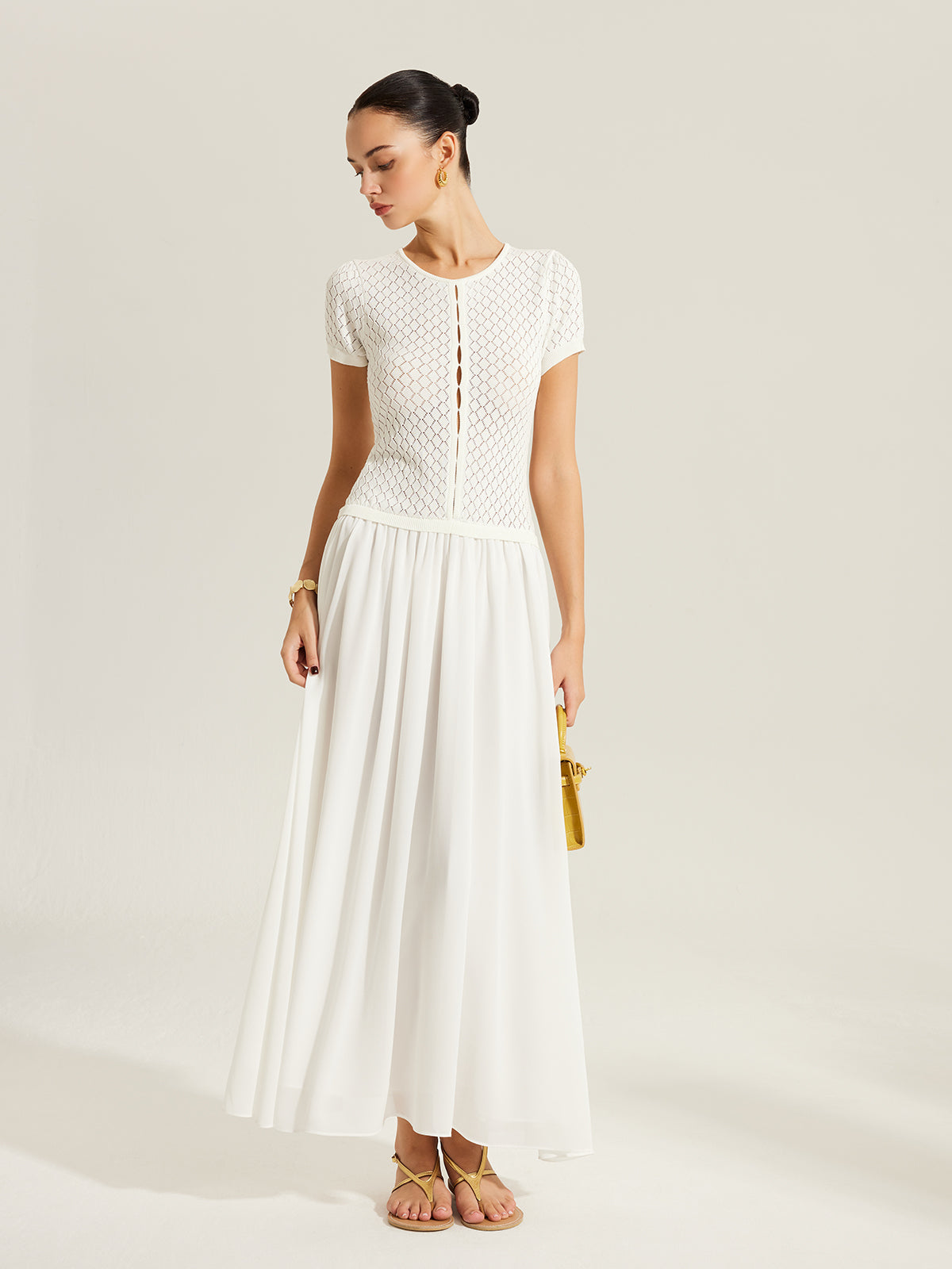 Strickkleid mit transparenten Einsätzen und Knopfleiste