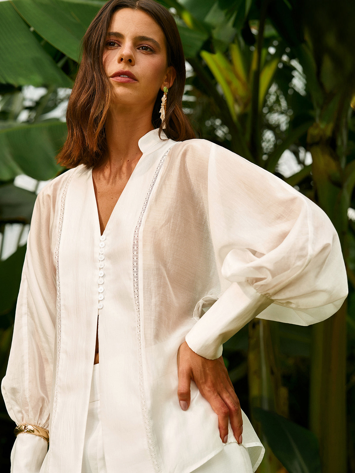 Chemisier transparent à manches bouffantes