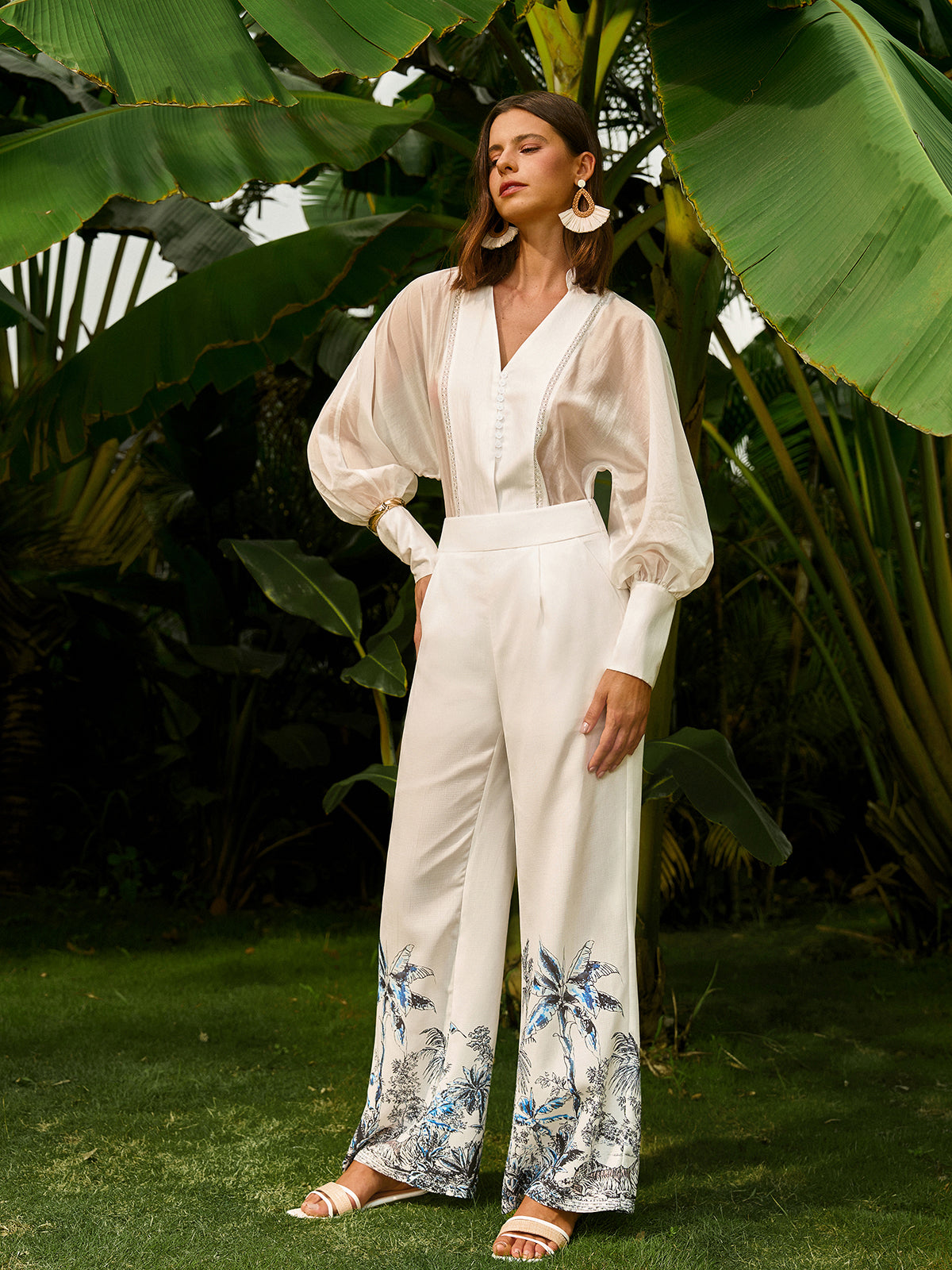 Blumenhose mit niedriger Taille und Taschen