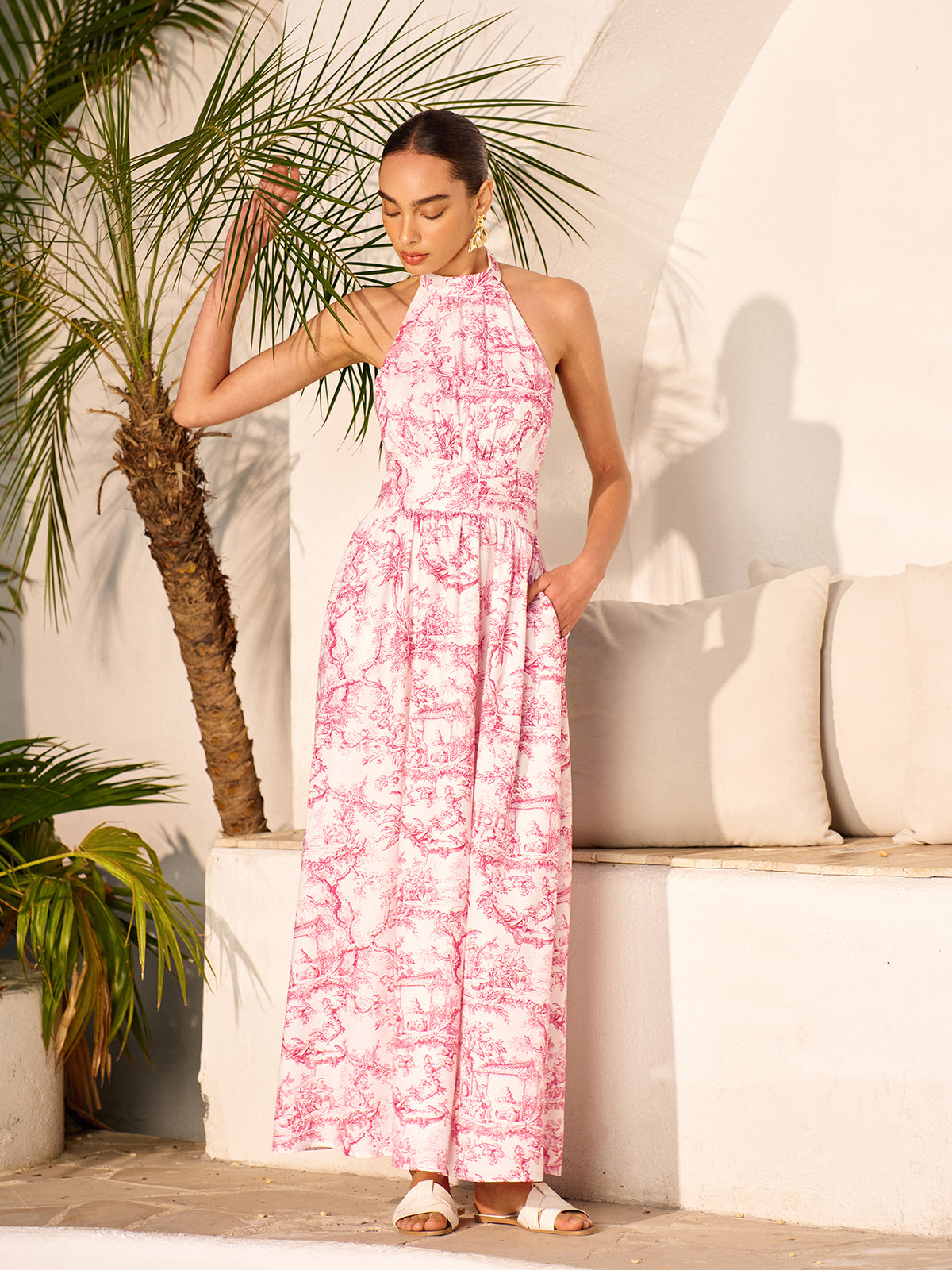 Robe dos nu imprimée à col halter et poches