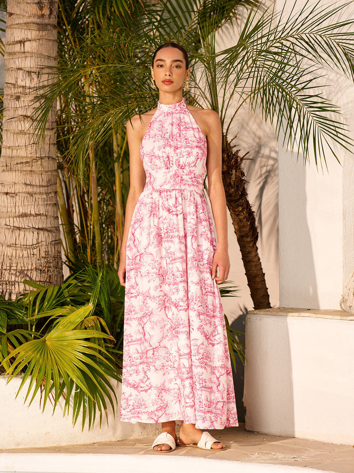 Robe dos nu imprimée à col halter et poches