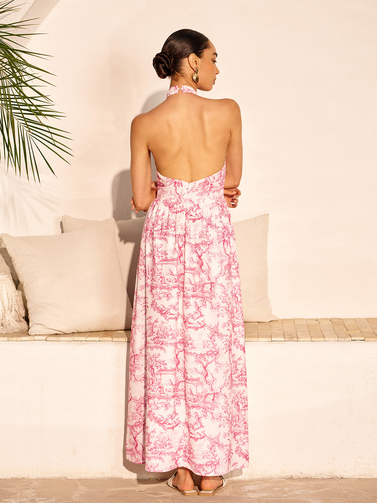 Robe dos nu imprimée avec poches et col halter