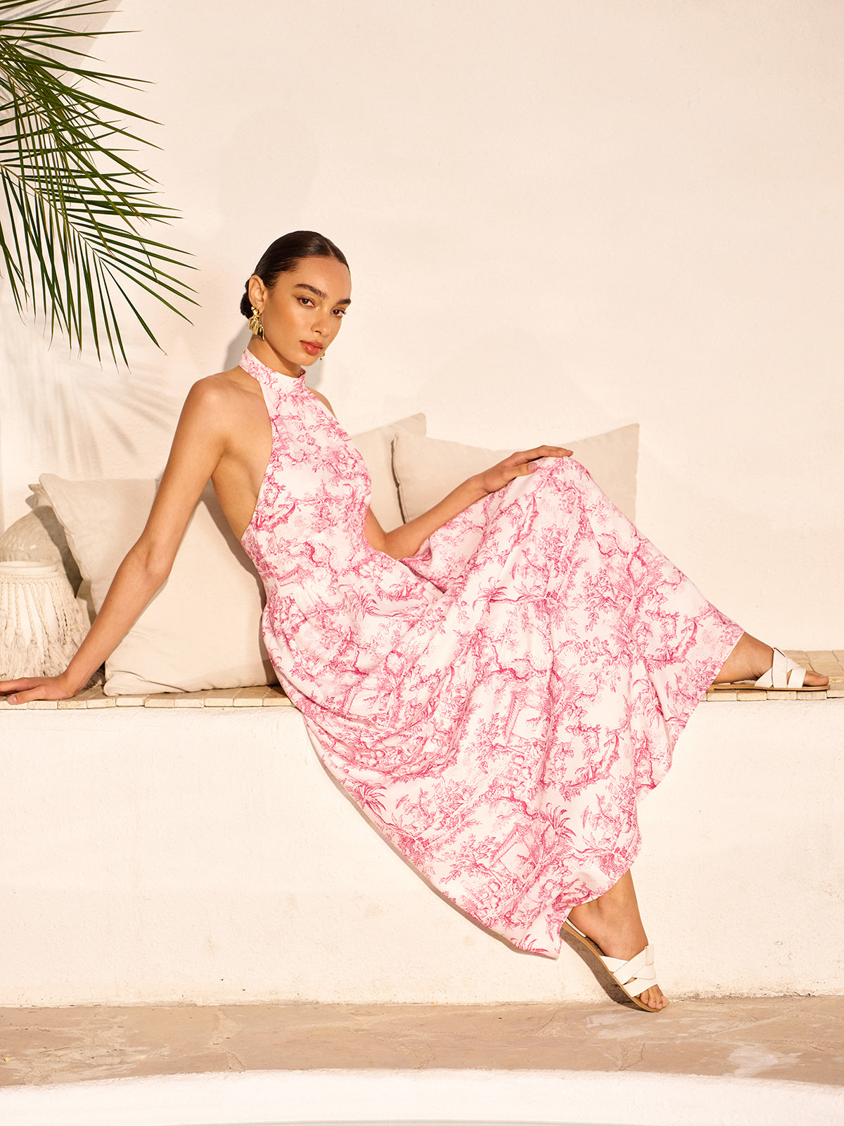 Robe dos nu imprimée à col halter et poches