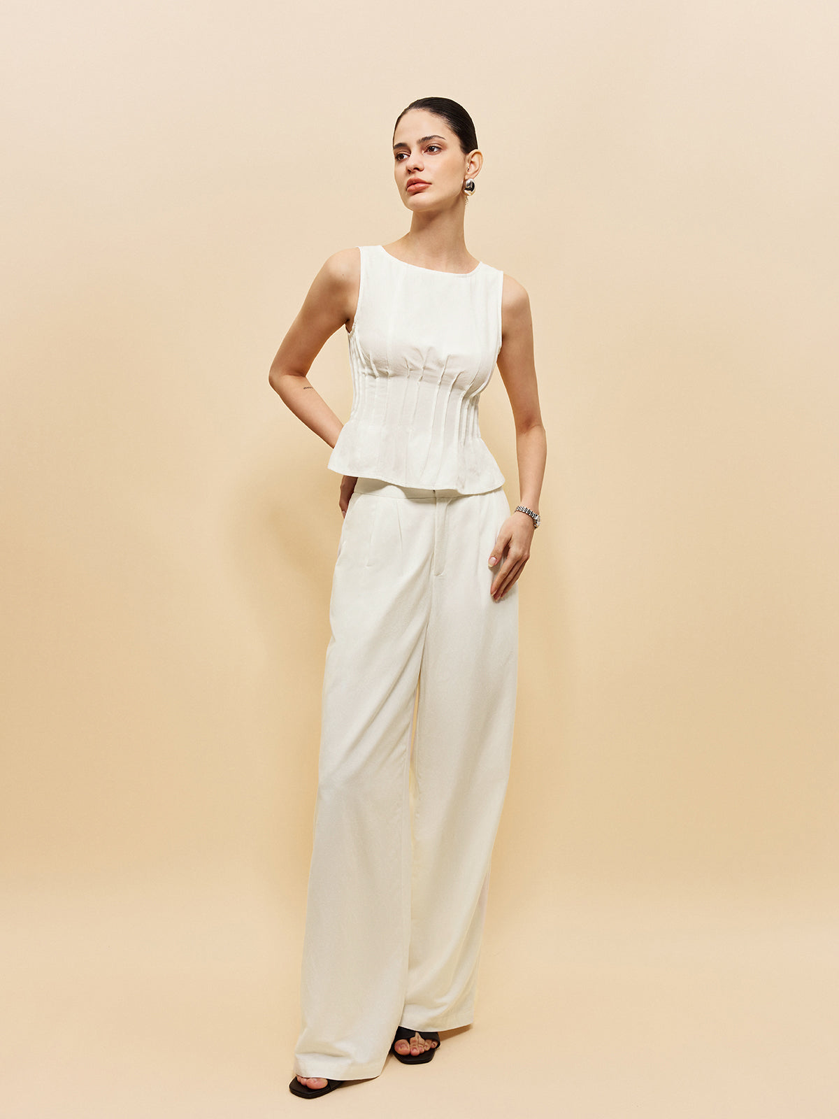 Ensemble haut péplum et pantalon à jambes larges