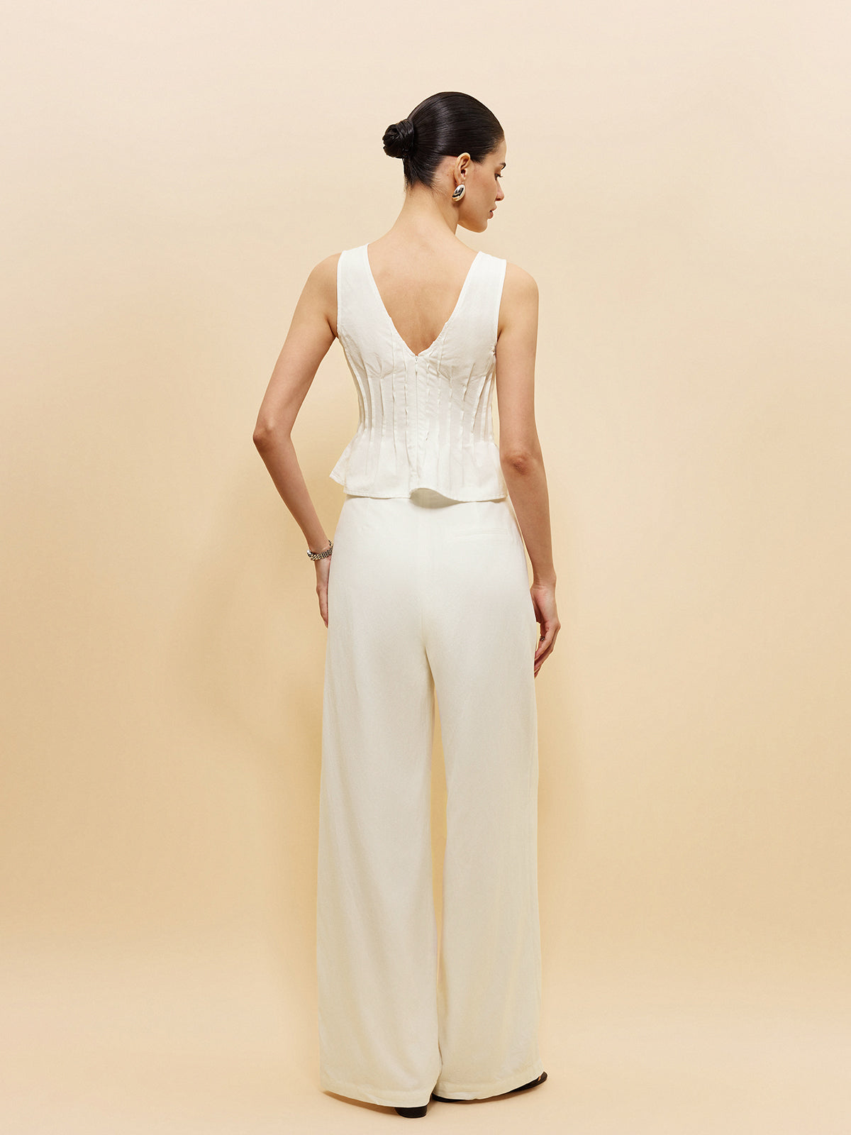 Ensemble haut péplum et pantalon à jambes larges