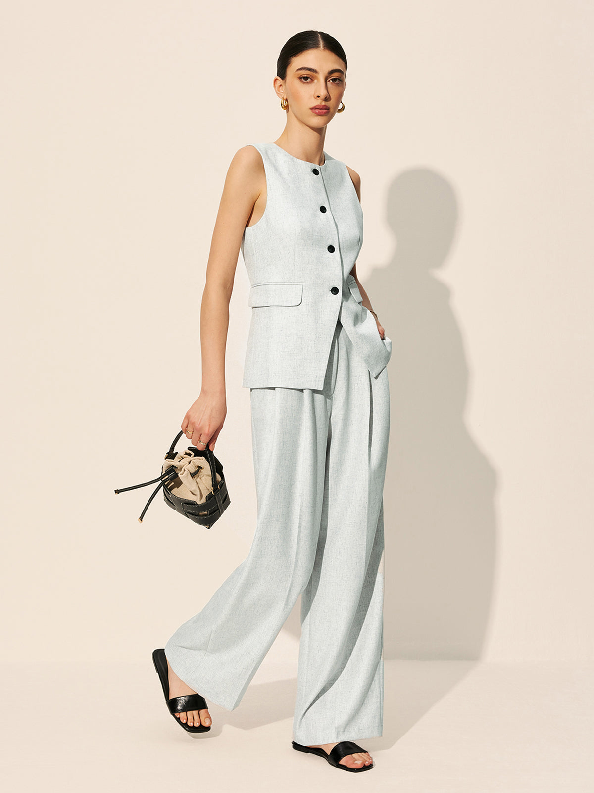 Ärmellose taillierte Weste mit Taschen