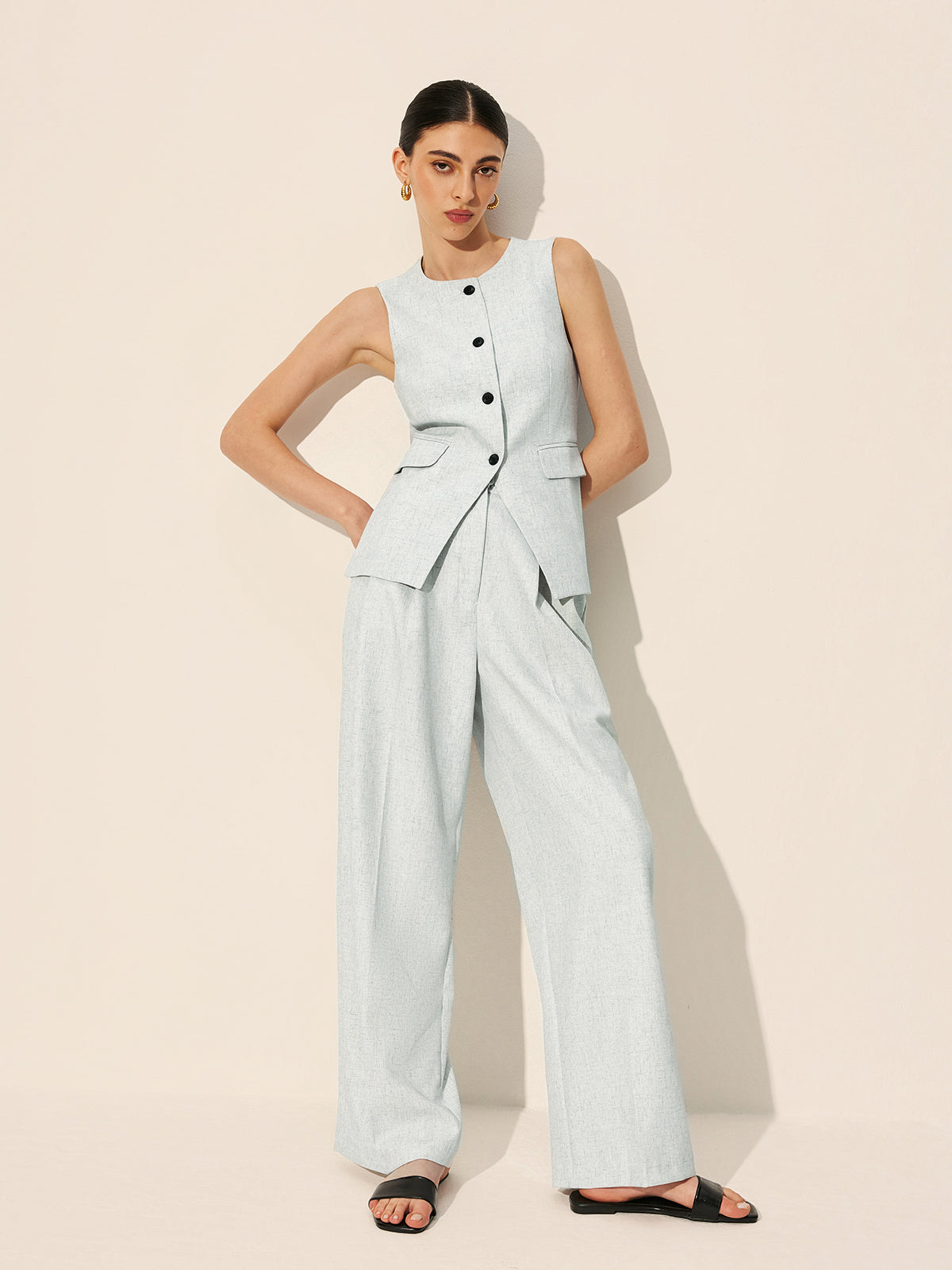 Ärmellose taillierte Weste mit Taschen