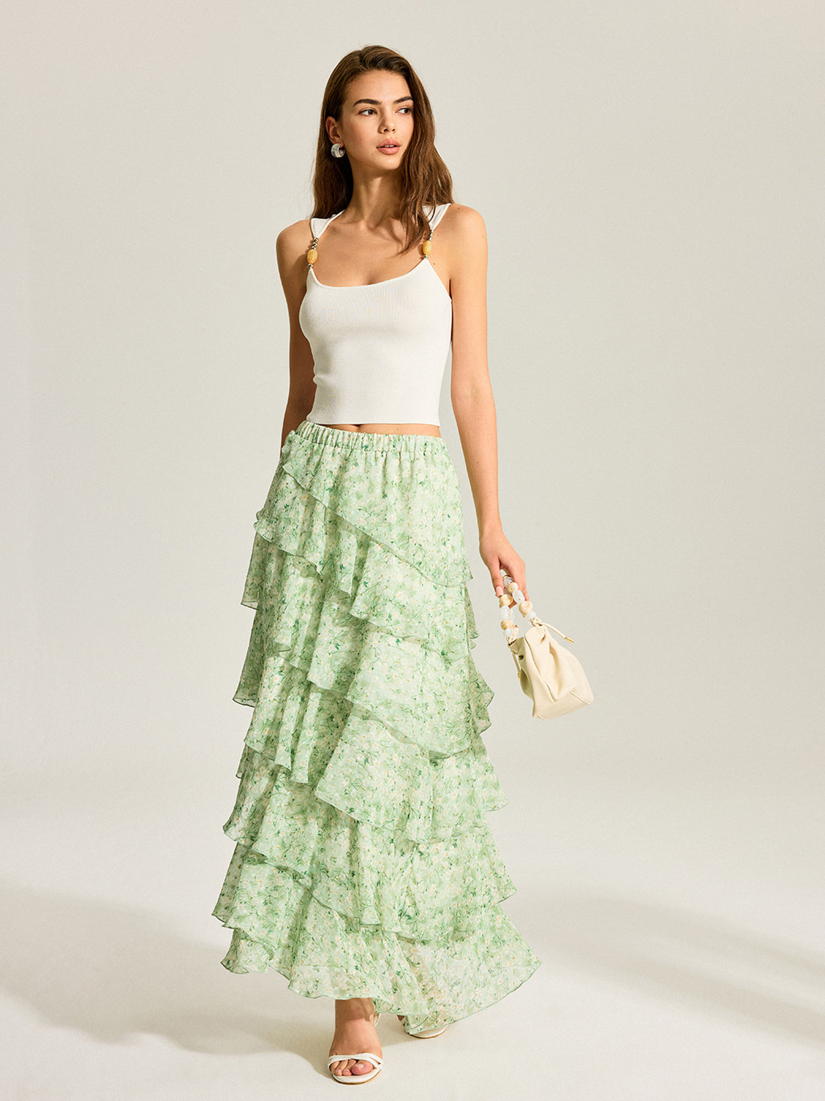 Halbtransparenter goldener Chiffon-Stufenrock mit Tupfen