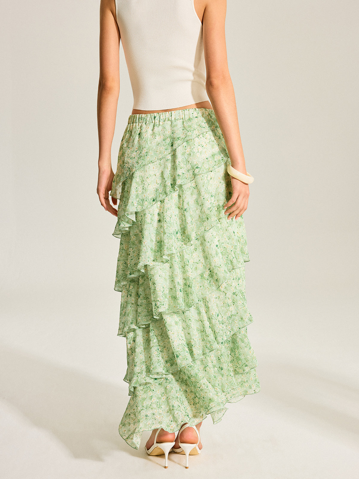 Halbtransparenter goldener Chiffon-Stufenrock mit Tupfen