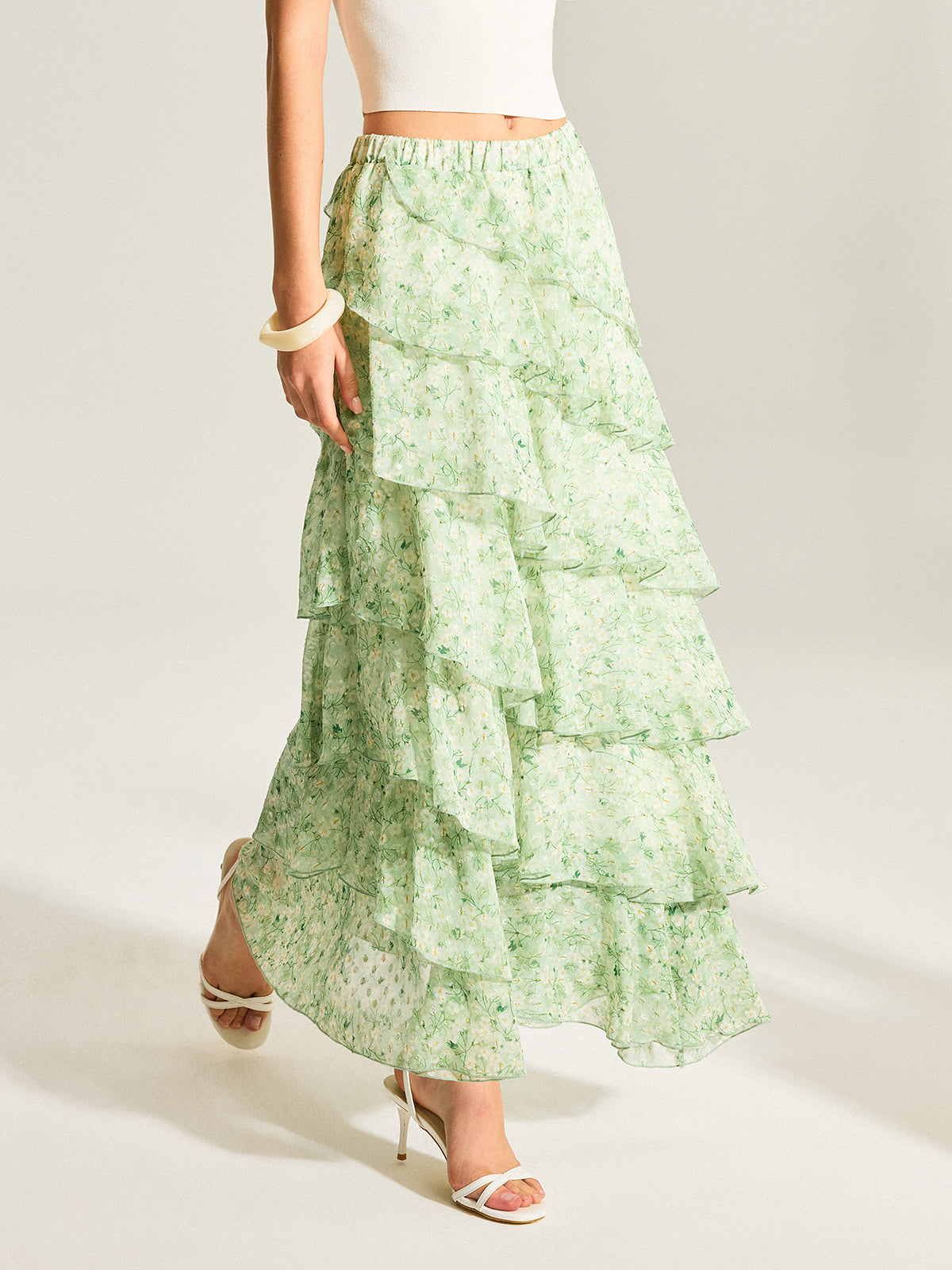 Halbtransparenter goldener Chiffon-Stufenrock mit Tupfen