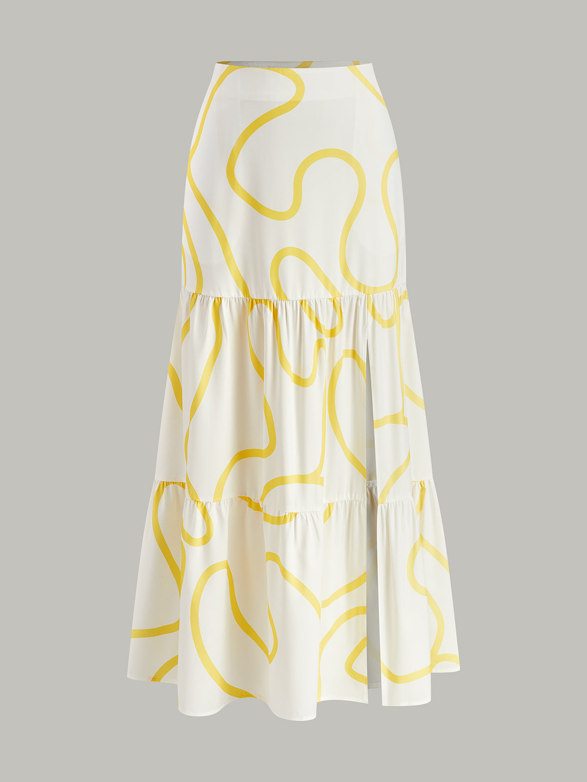 Ensemble crop top asymétrique à imprimé abstrait et jupe maxi à volants