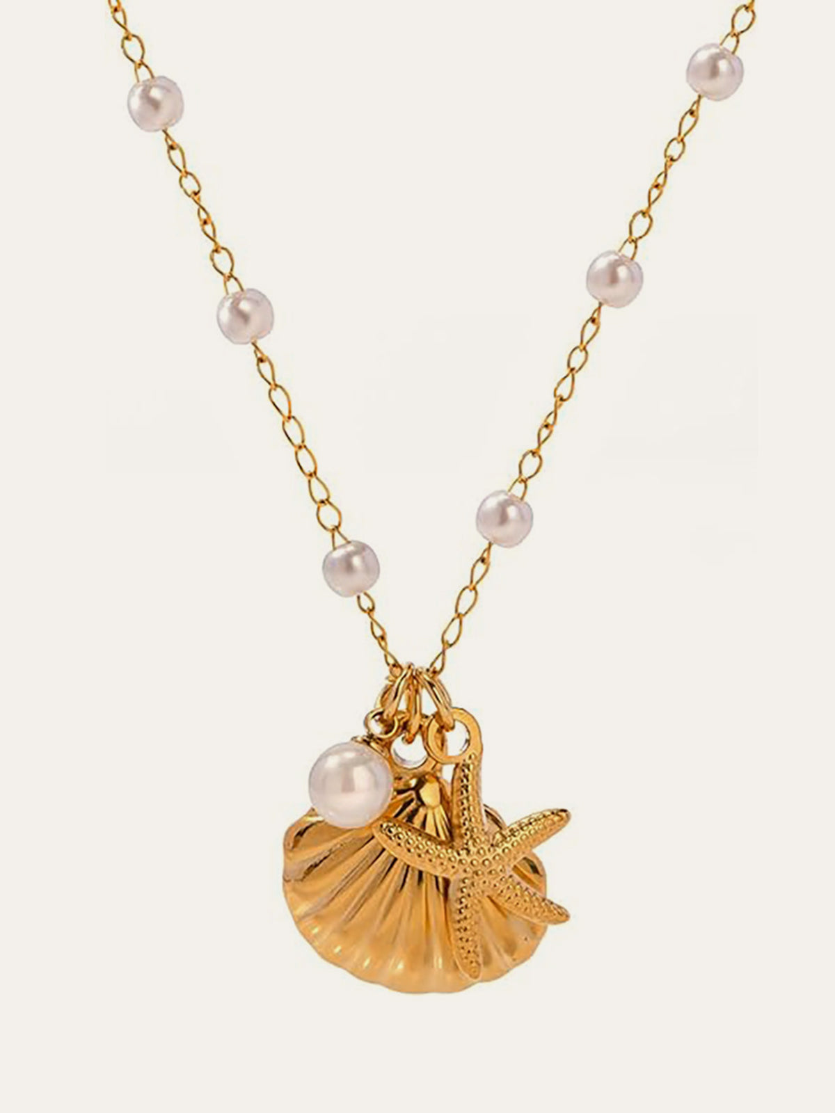Collier coquillage doré et étoile de mer avec perles