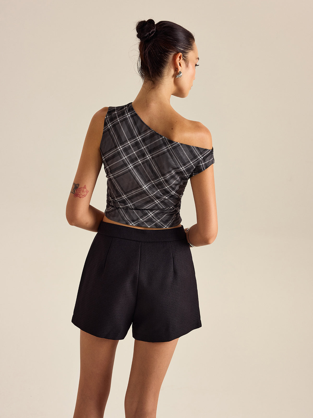 Haut asymétrique à carreaux