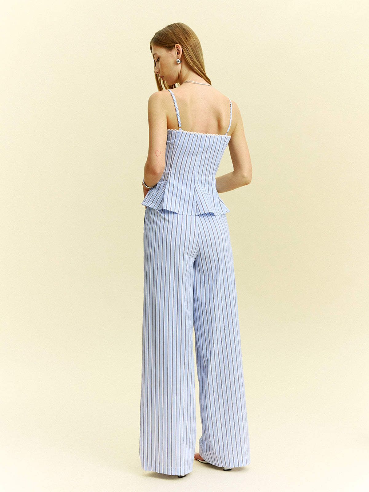 Gestreiftes Peplum-Oberteil und Hose mit weitem Bein Set