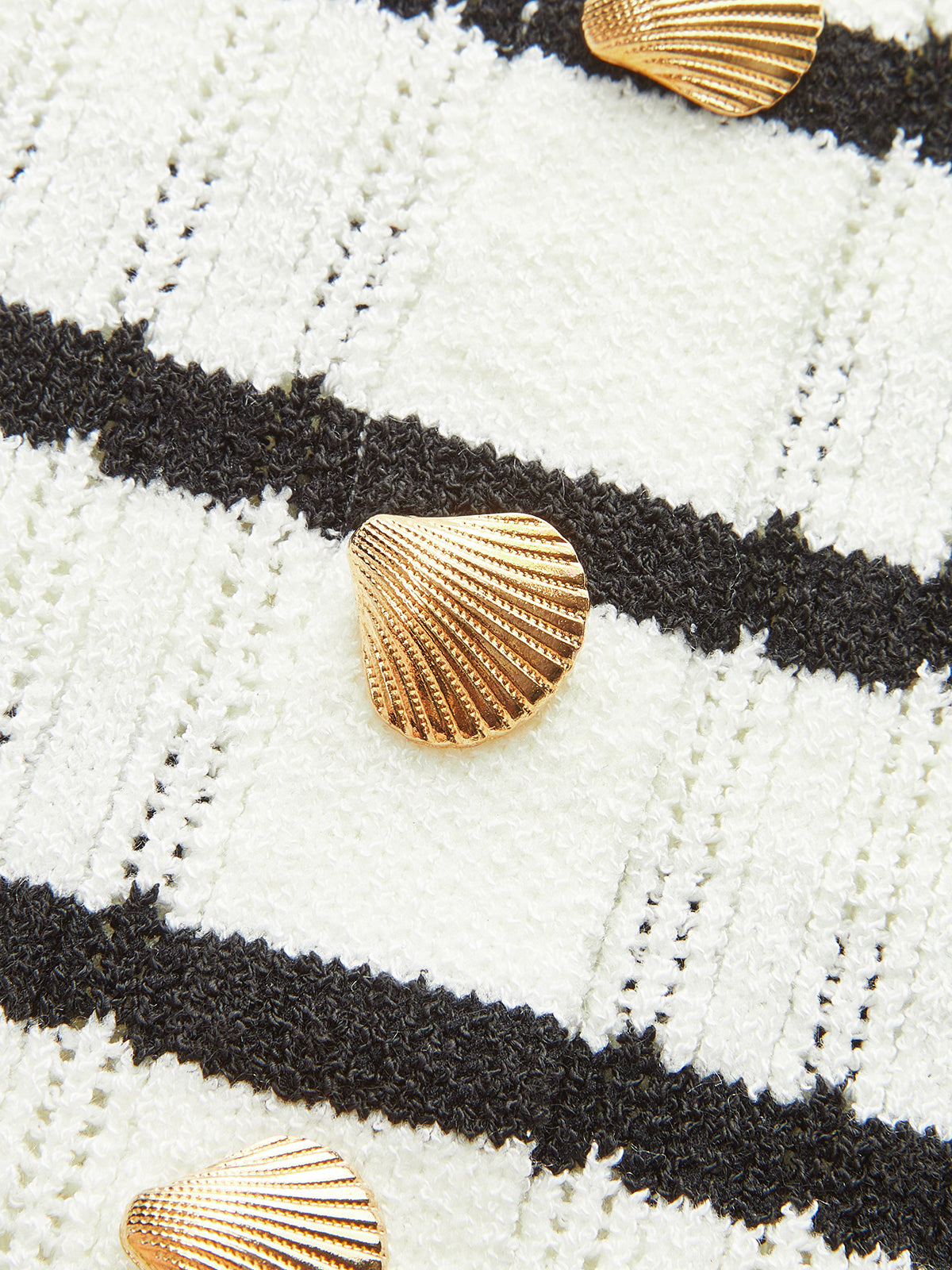 Débardeur boutonné en métal rayé