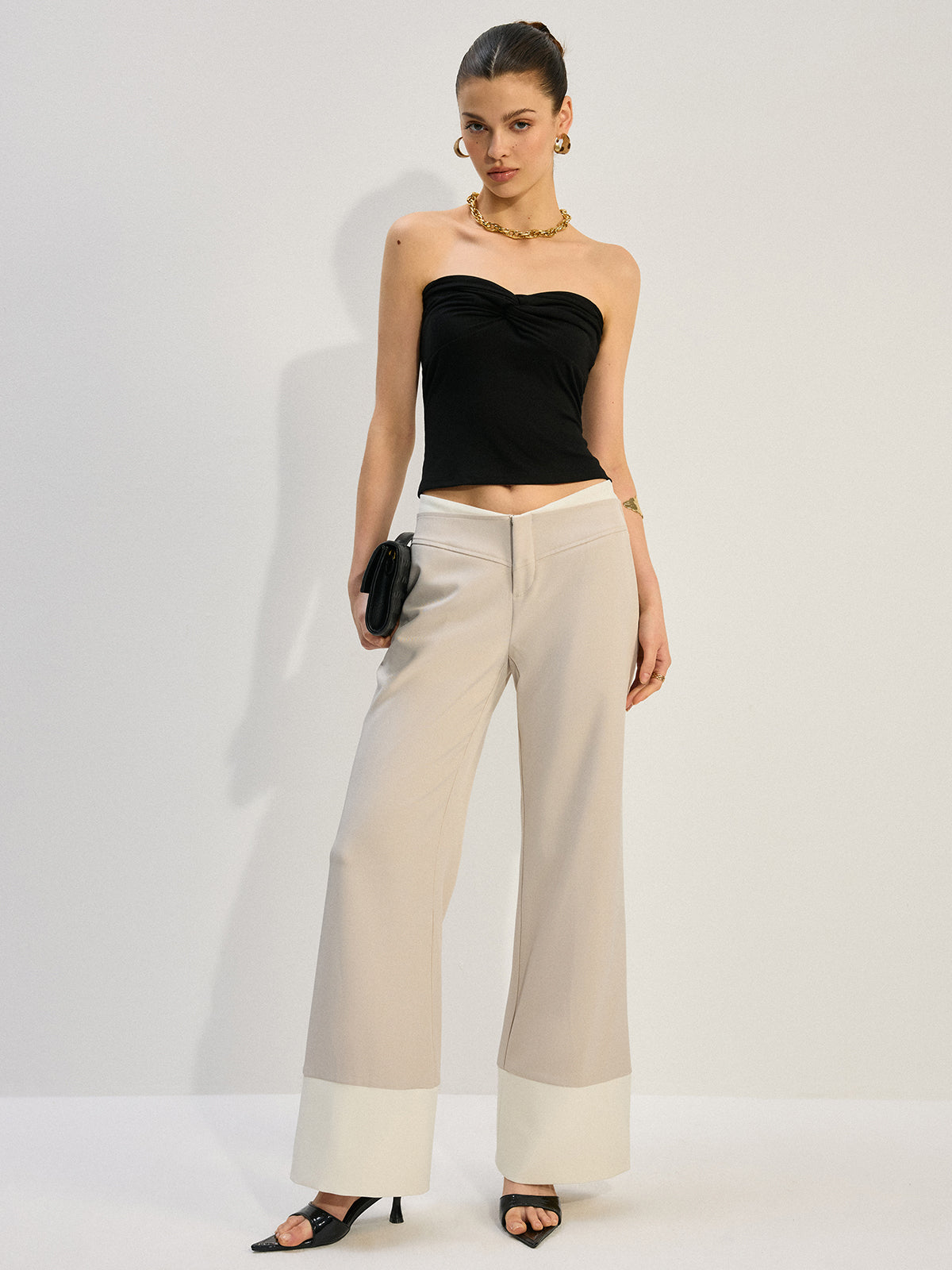Weite Hose mit niedriger Taille und Colorblock-Saum