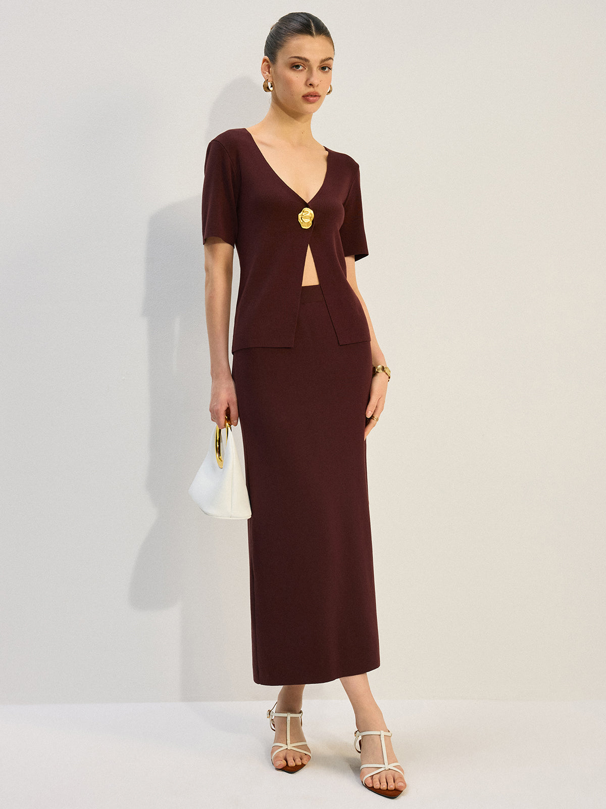 Ensemble tricoté coordonné col en V avec décorations métalliques