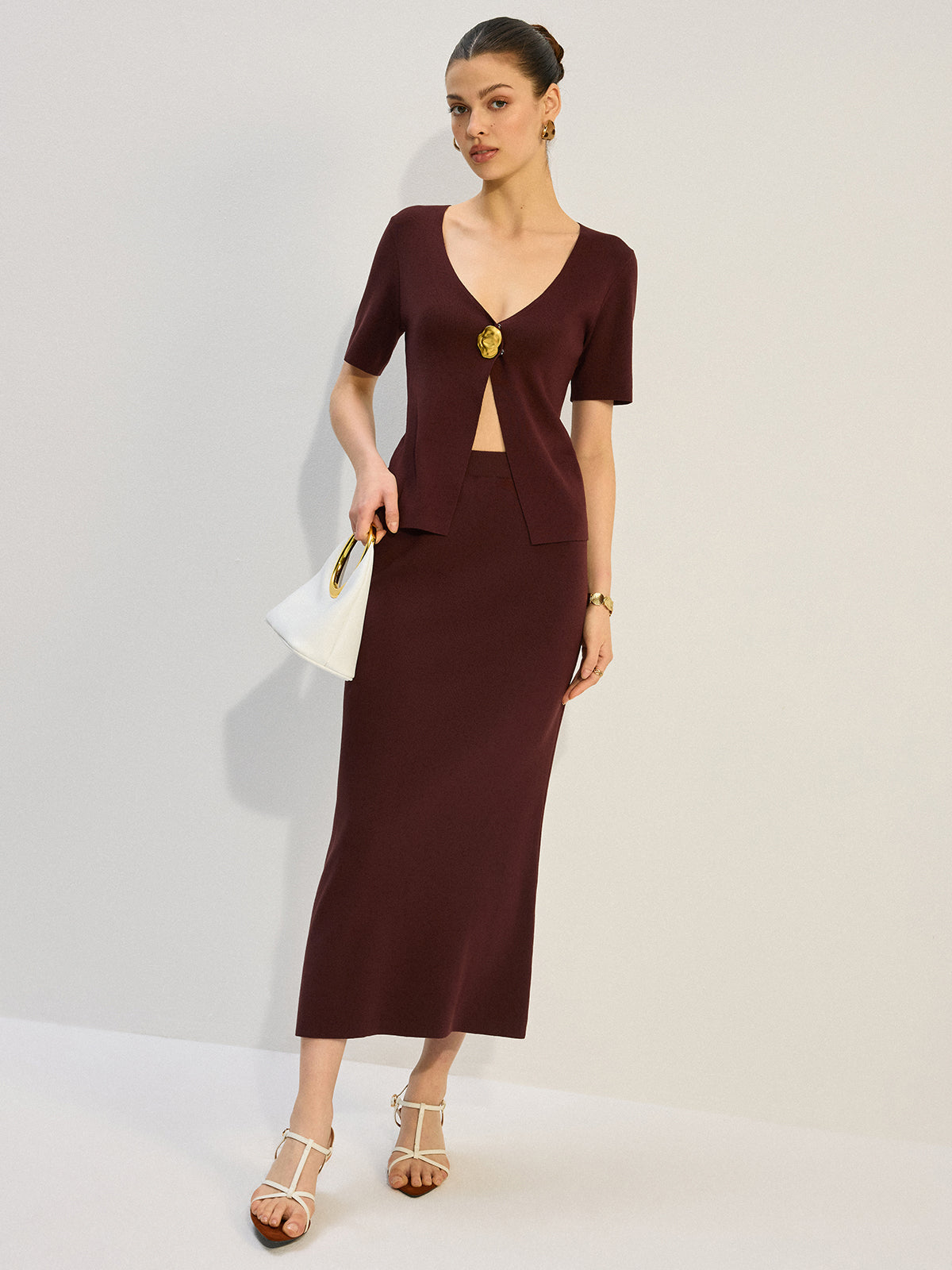 Ensemble tricoté coordonné col en V avec décorations métalliques