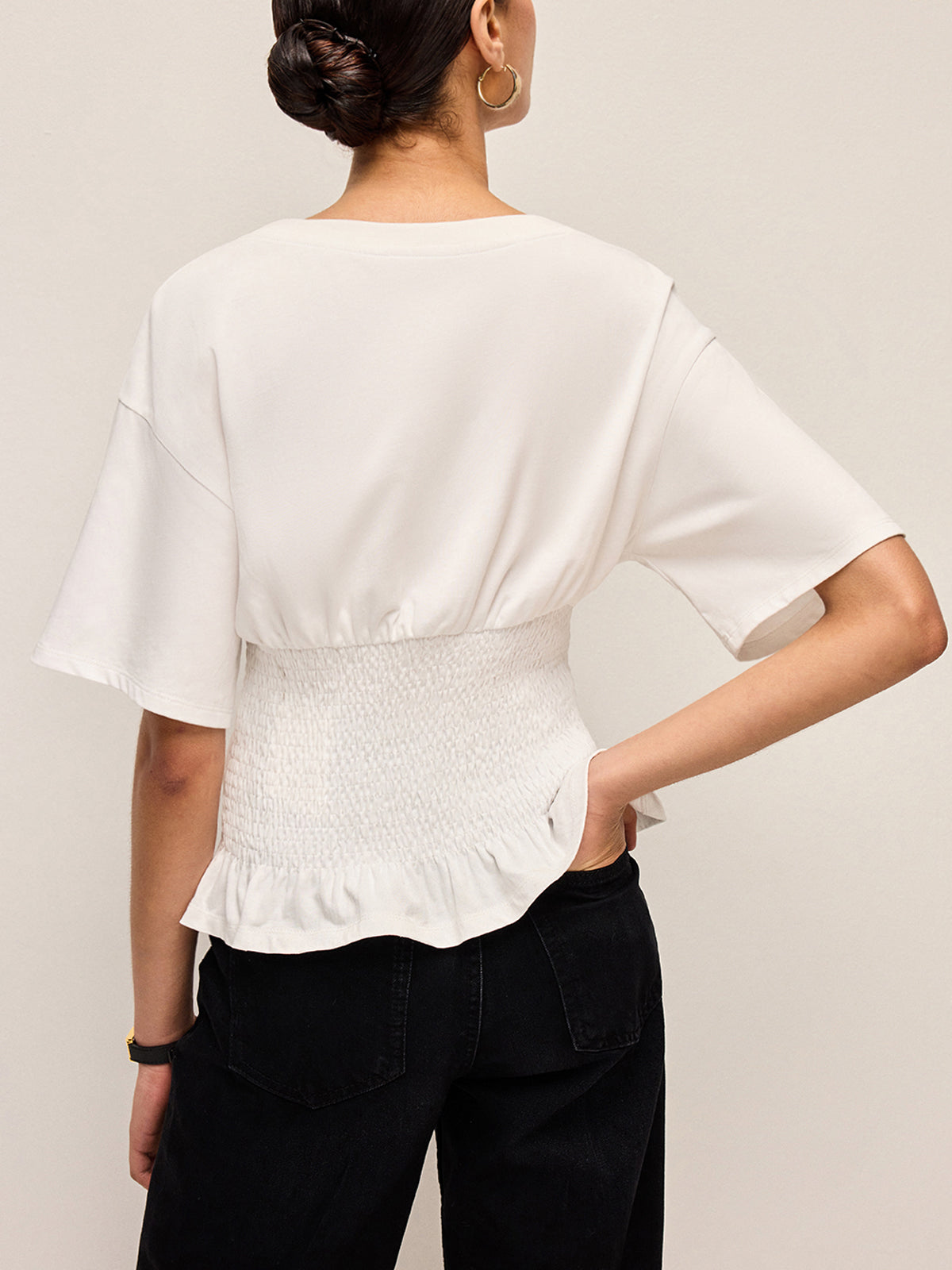 Haut en coton à taille smockée et ourlet à volants