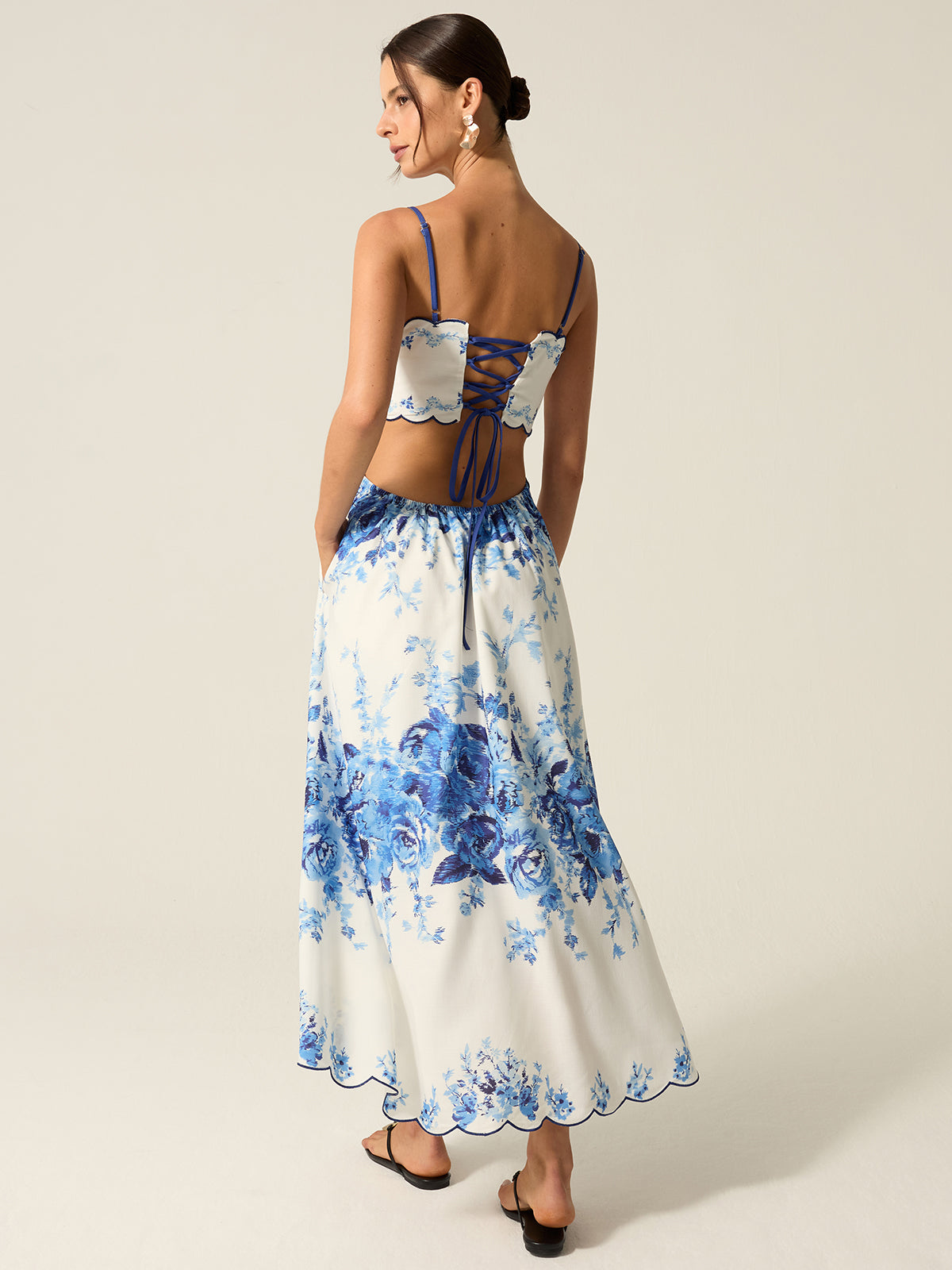 Maxikleid mit Blumenmuster, Cut-Outs und Taschen