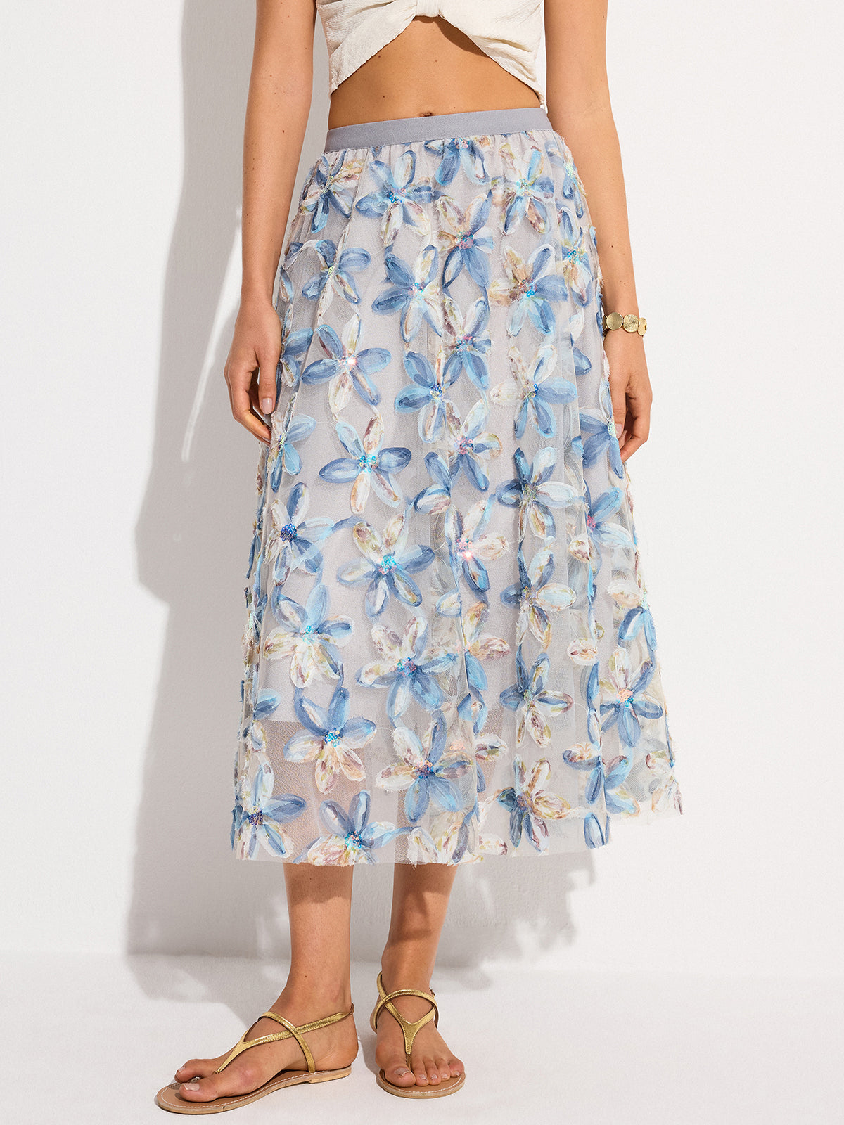 Halbtransparenter Midirock aus besticktem Netzstoff mit Blumenmuster
