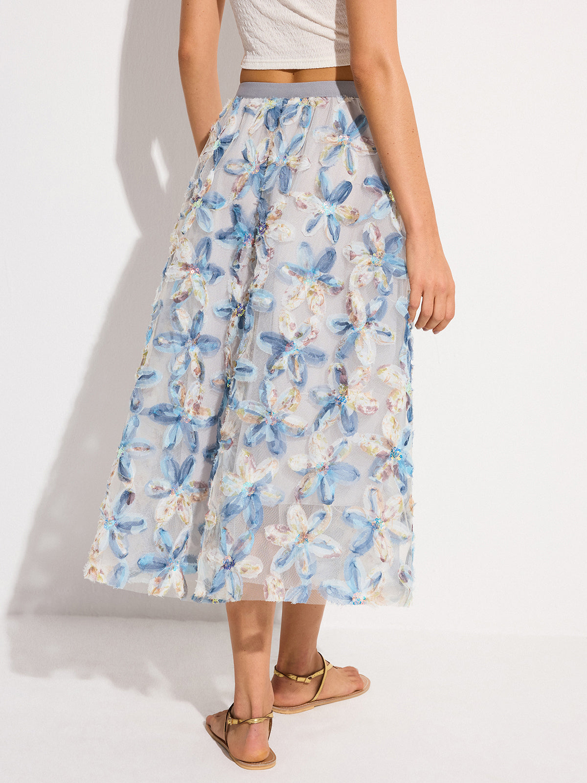 Halbtransparenter Midirock aus besticktem Netzstoff mit Blumenmuster
