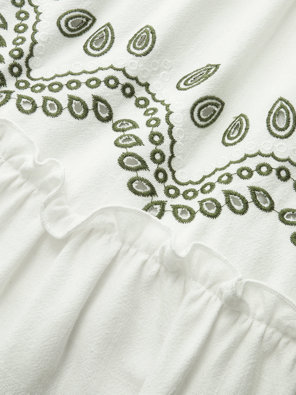 Mini-robe brodée ceinturée en lin et coton