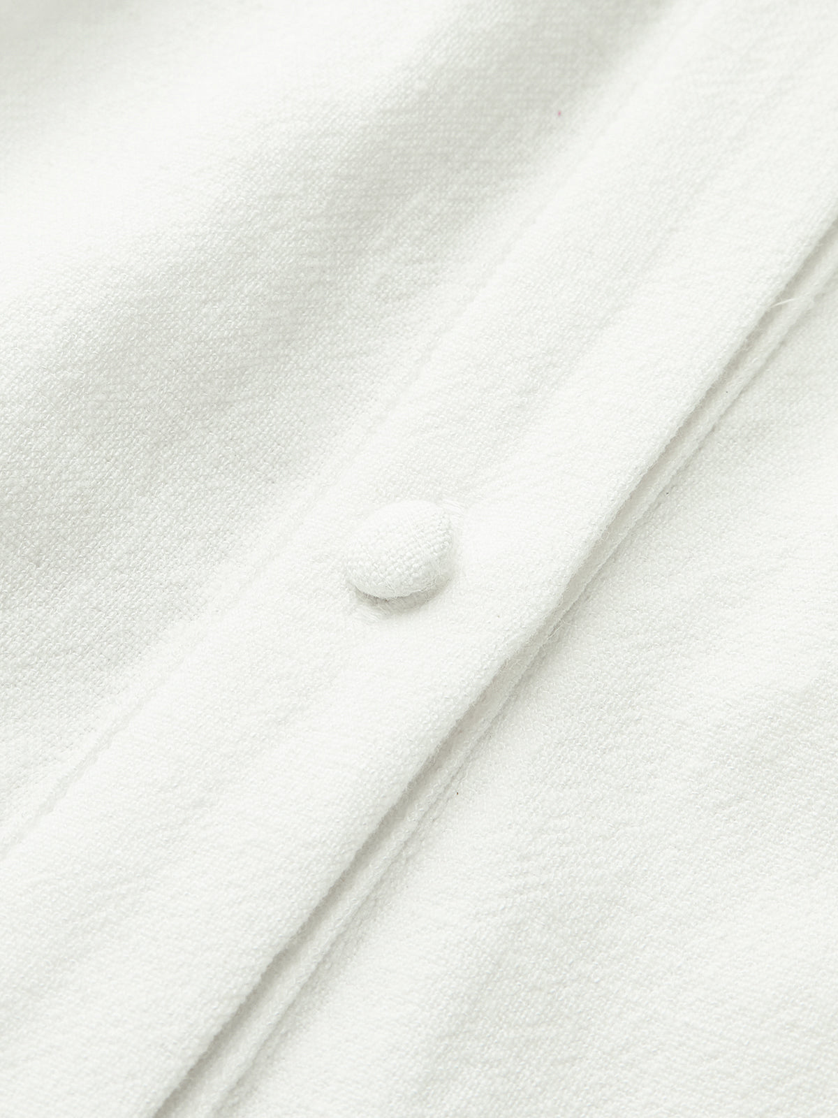Mini-robe brodée ceinturée en lin et coton