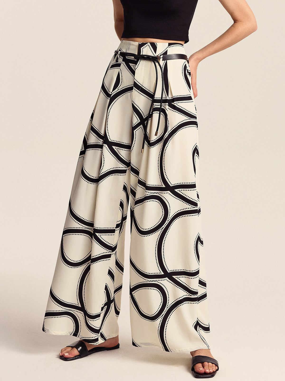 Pantalon à jambes larges semi-transparent à motifs