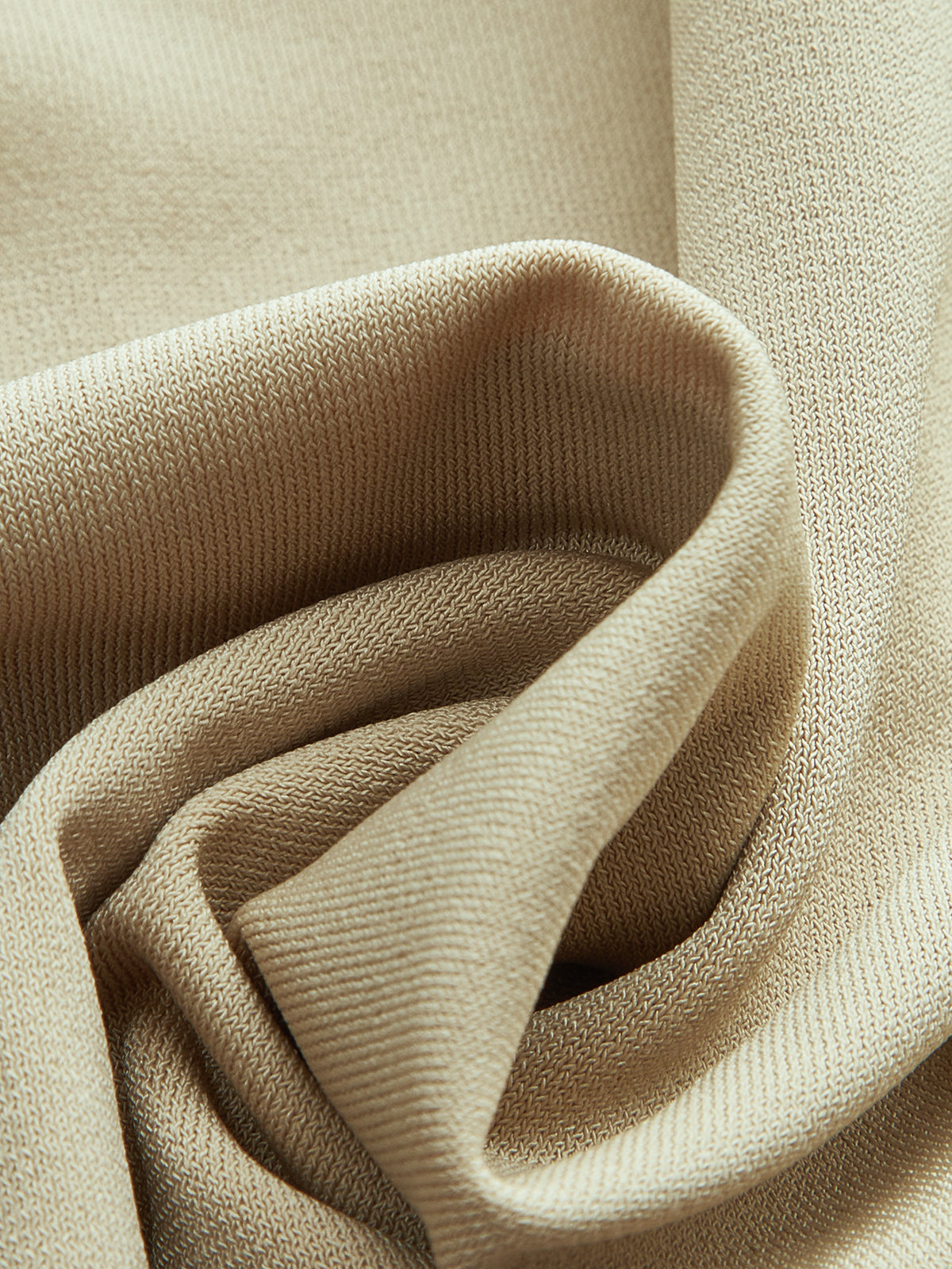 Haut asymétrique à col halter froncé