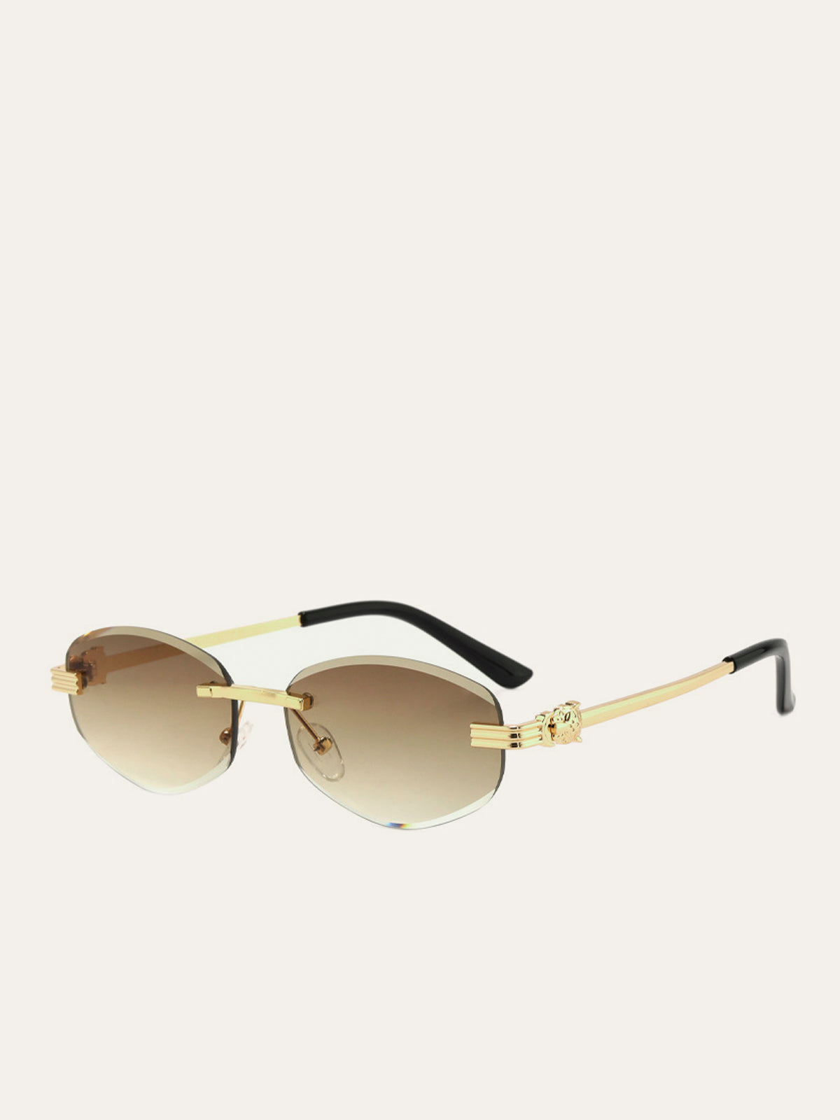 Lunettes de soleil dorées sans monture à verres dégradés