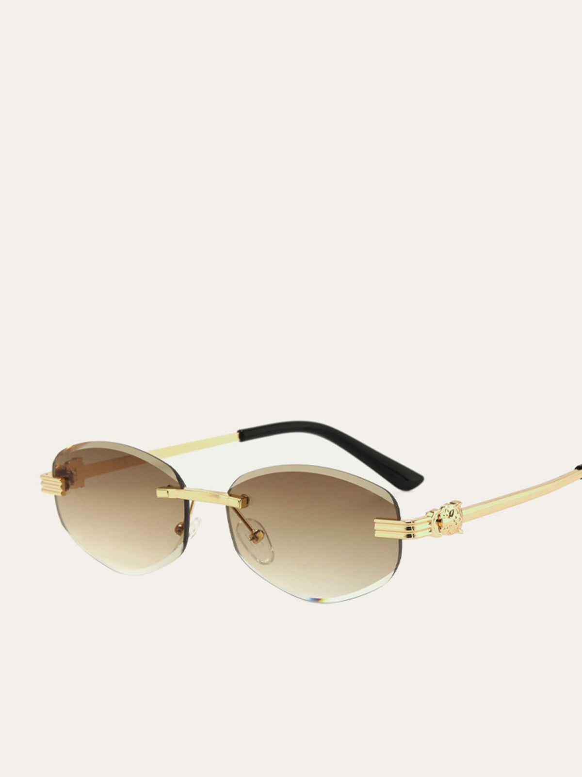 Lunettes de soleil dorées sans monture à verres dégradés
