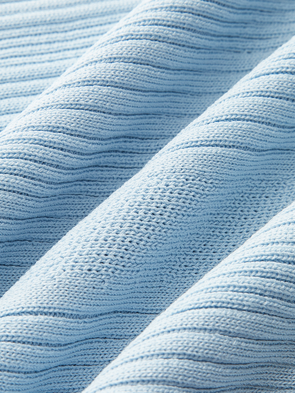 Robe longue en tricot sans manches boutonnée sur le devant
