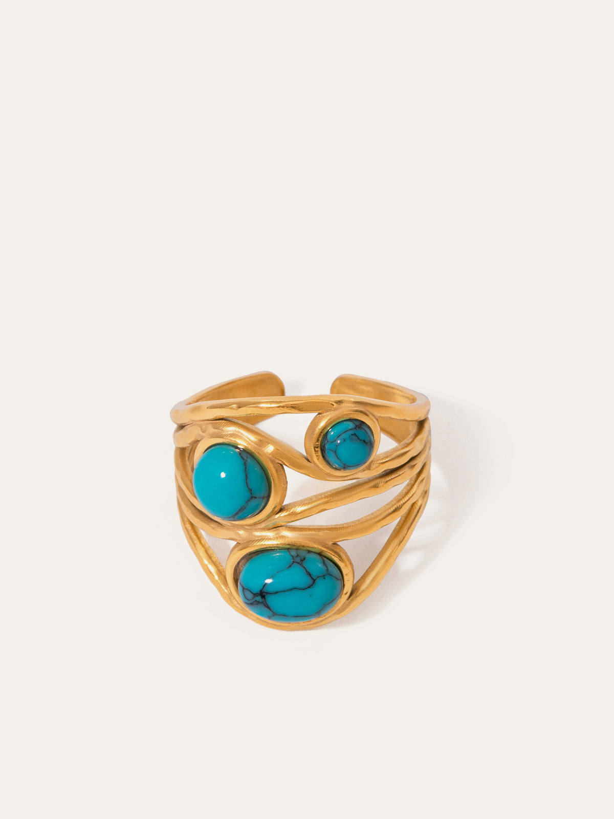 Bague dorée incrustée de turquoise